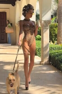 Leopard Print Bodysuit and Hair Rollers