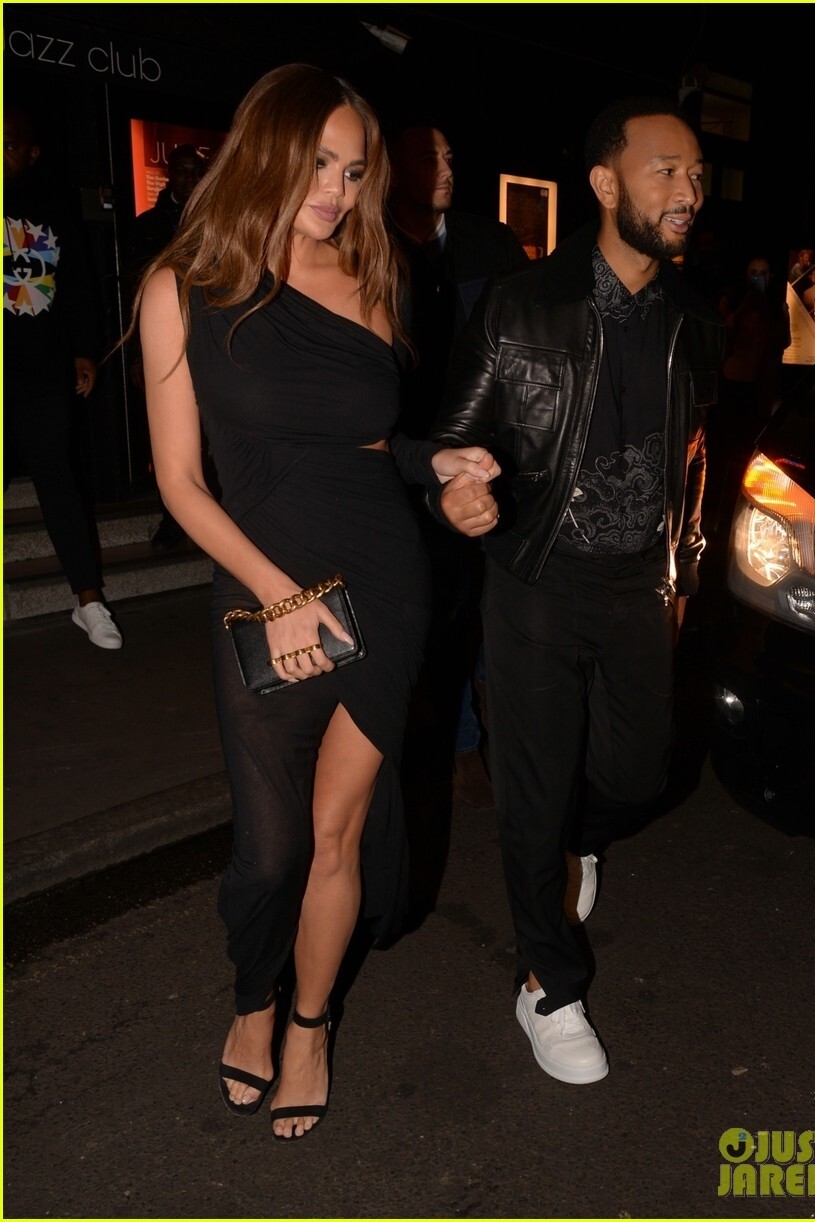 One-Shoulder Gown and Four-Ring Clutch