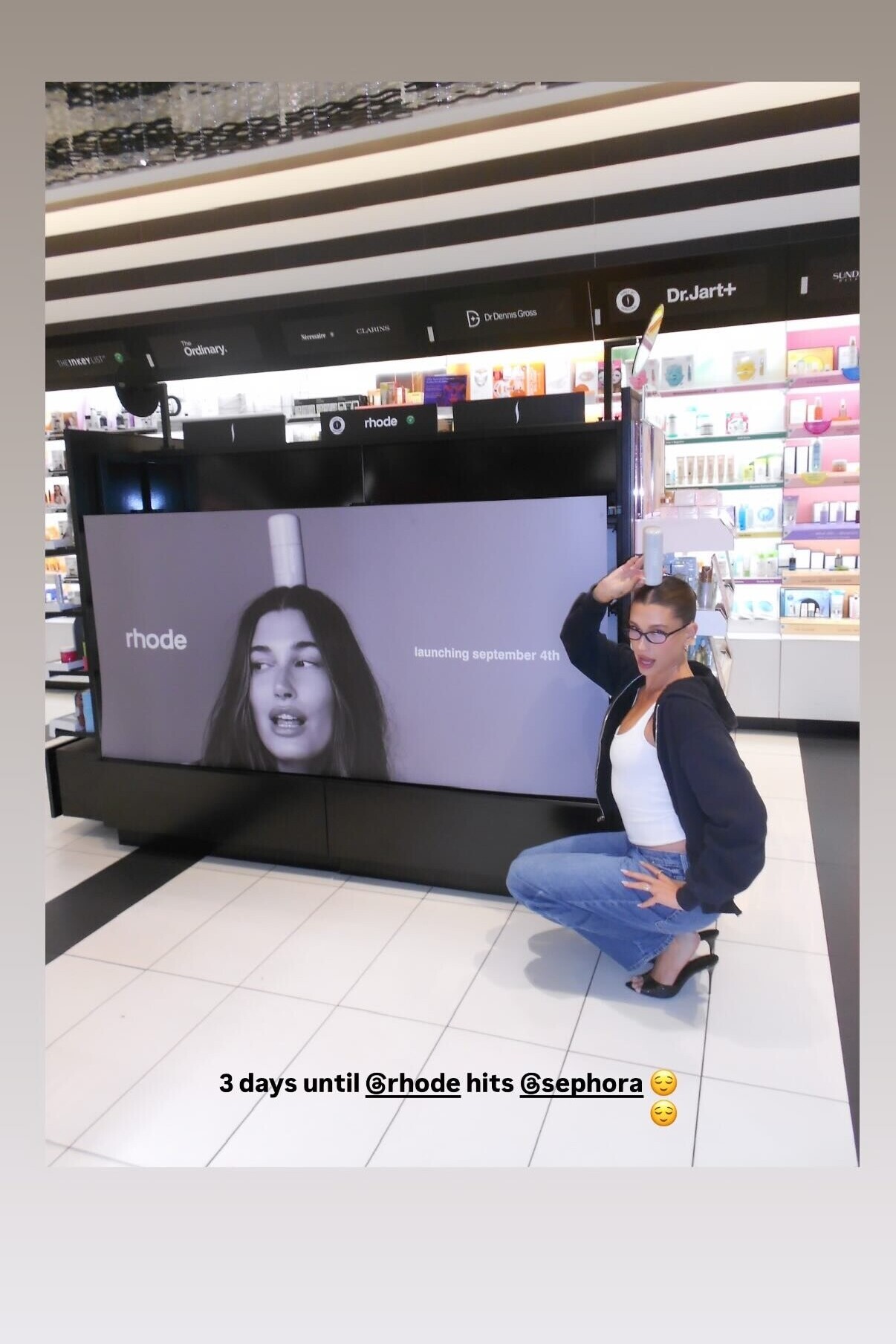 Black Zip-Up Hoodie, White Tank, and Baggy Jeans