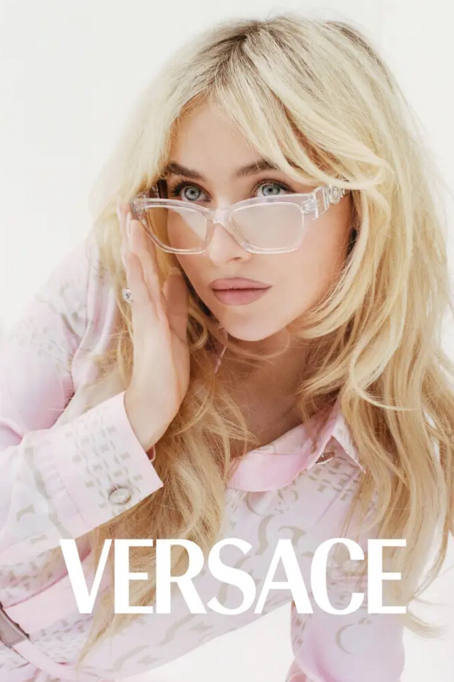 Clear Cat-Eye Glasses and Pink Patterned Silk Dress